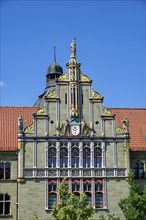 Detail of the façade with the city coat of arms, Halle District Court, designed by architect Karl