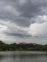 Thunderclouds over the Sulmsee, on a hill Seggau Castle, near Leibnitz, Styria, Austria, Europe