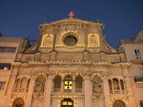 Historic building with illuminated façade at night, valetta, mediterranean sea, malta