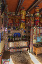 Colorful altar in a private house in Phobjikha