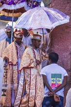 Unidentified Ethiopian priest with umbrella