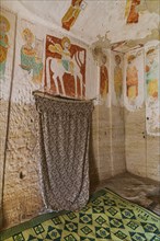 Frescos on the wall of rock hewn Abuna Yemata Guh church in Hawzen