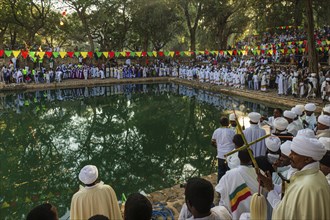 People gathering at Timkat festival at Fasilides Bath in Gondar, Ethiopia, Africa