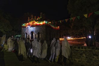 People gathering at Timkat festival at Fasilides Bath in Gondar, Ethiopia, Africa