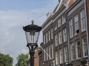 Historic buildings with a street lamp in the foreground, clear sky, utrecht, Netherlands