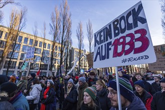 People holding banners against the right wing party AfD at a manifastation in Munich, Germany,