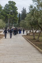 A group of Israeli Jews visiting the temple Mount despite official rabbinic ban on setting foot on