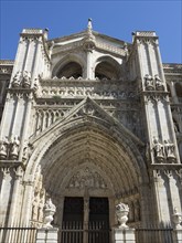 Detailed Gothic entrance façade of a church with impressive sculptures and decorations, Toledo,