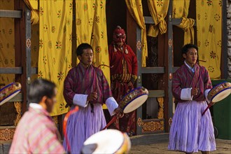 Monks danzing for the Tsechu at Trongsa Dzong