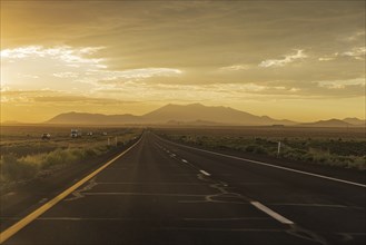 Real sunset on an highway leading to Flagstaff
