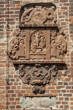Old relief on the outside wall, church, Eckernforde, Schleswig-Holstein, Germany, Europe
