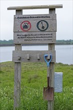 Dog faeces scooping station, Geltinger Birk, Geltinger Bucht, Nieby, Schleswig-Holstein, Germany,