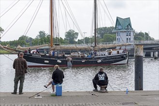 Sailing ship Amazone docks, spectators, harbour, Kappeln, Schlei, Schleswig-Holstein, Germany,