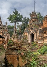 Reliefs on exterior of ruined pagoda, Indein, Inle Lake, Myanmar, Asia