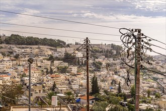 Arabic housing in Jerusalem with electrical wiring in the frame