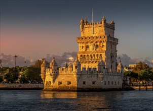 Lisbon's Belem tower at sunset seen from Tagus side