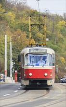 Frontal shot of the red tramway in Prague