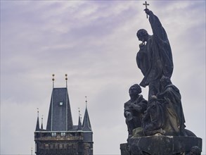 Low angle shot of teh Bridge Tower at Charles Bridge