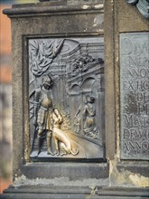 Tradition says that if you rub and touch the bronze plaque is supposed to bring good luck and