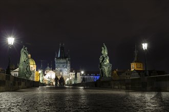 Prague's Charles bridge at night