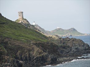 Coastal landscape with lighthouse on a rocky hill, ajaccio, corsica, france