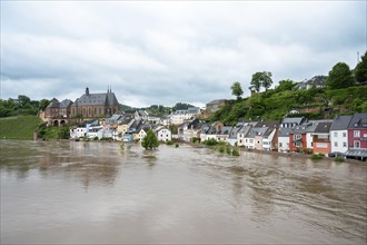 Flood of the river Saar, Saarburg in Saarland, Germany, flooded trees and paths, high water level,