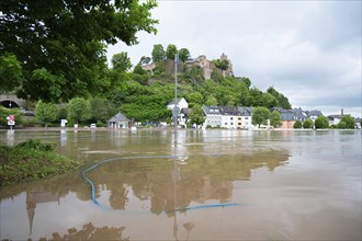 Flood of the river Saar, Saarburg in Saarland, Germany, flooded trees and paths, high water level,