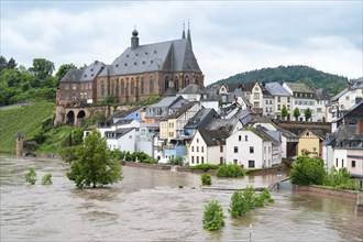 Flood of the river Saar, Saarburg in Saarland, Germany, flooded trees and paths, high water level,