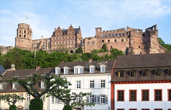 Heidelberg, mediaevial castle, red sandstone ruins tower looms majestically over the Neckar river