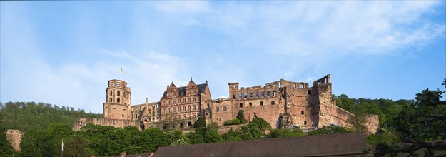 Heidelberg, mediaevial castle, red sandstone ruins tower looms majestically over the Neckar river