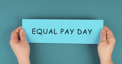 Equal pay day, raising awareness of gender pay gap, income of men and women for work, disadvantage
