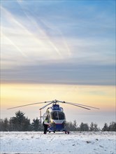 Air rescue helicopter from Luxembourg, emergency transport in Trier, misson in snow, winter