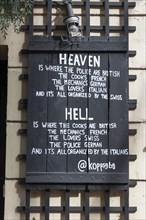 Heaven and hell, slogan on black-painted wooden slats, Gothenburg, Västra Gotalands län, Sweden,