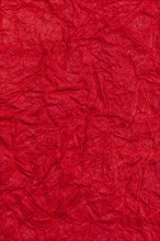 Background surface of wrinkled red and crumpled paper