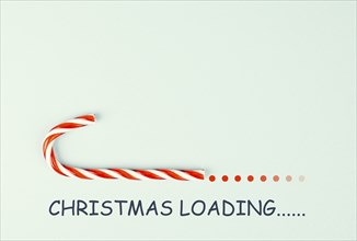 Candy cane loading bar for christmas, seasonal holidays, xmas greeting card, copy space