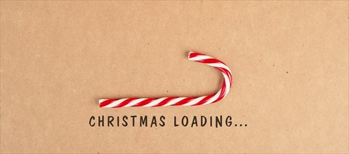 Candy cane loading bar for christmas, seasonal holidays, xmas greeting card, copy space
