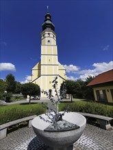 Fountain of gratitude in front of the pilgrimage church of the Assumption of the Virgin Mary in