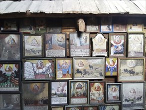 Votive pictures, votive tablets on the walls of the chapel of grace inside the church, pilgrimage