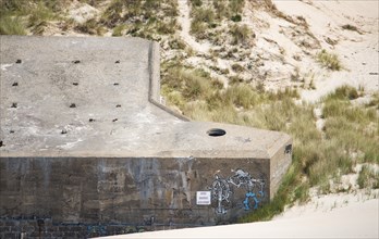 Ruin of a german bunker in Normandy, France from the Second World War, D-Day military invasion by