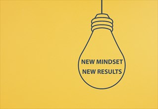 New mindset new results is standing in the light bulb, coaching strategy, optimistic and positive