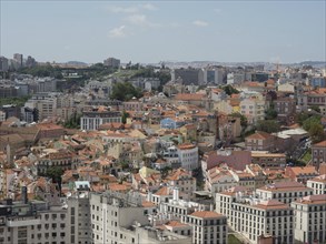 Urban landscape with closely spaced houses with red roofs, Lisbon, portugal