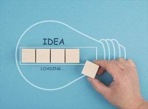 Idea loading, progress bar with a light bulb, starting a new business, development and growth