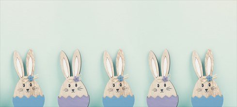 Panoramic easter holiday greeting card with cute bunnies, rabbits in spring, banner or header