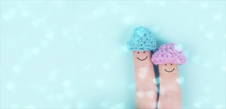 Happy, similing face on finger, couple cuddle together, support, relationship and friendship