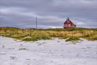 House on Hvit beach in Eggum, Rorbur, Bostad, Vestvagoy, Lofoten, Nordland, Norway, Europe