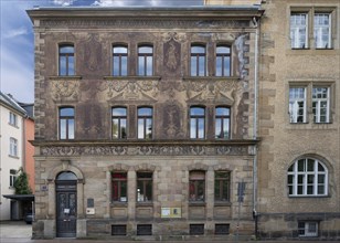 Historic residential building with frescoes on the facades, today esg Café, Evangelische