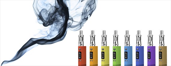 Eight multicolored electronic cigarettes and smoke, isolated on white background