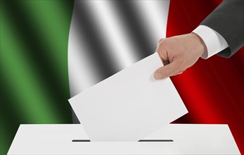 The Italian flag and the hand with the bulletin about the ballot box