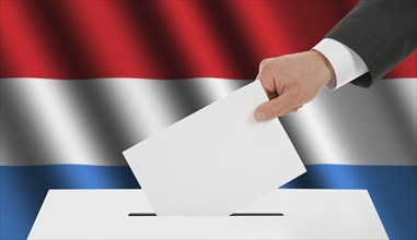 The Luxembourg flag and the hand with the bulletin about the ballot box