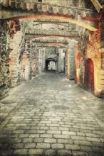 Vintage style image of old european town street